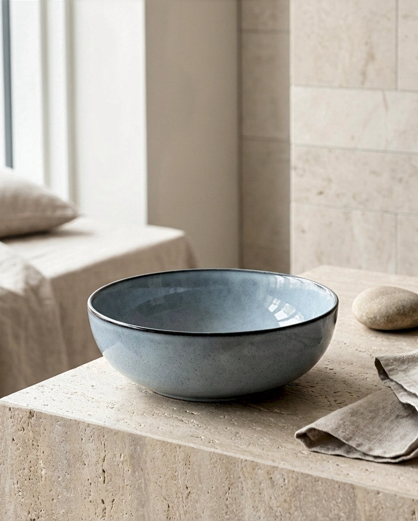 Single Scandic Soul Nordic Fjord bowl with blue glaze on a light stone counter