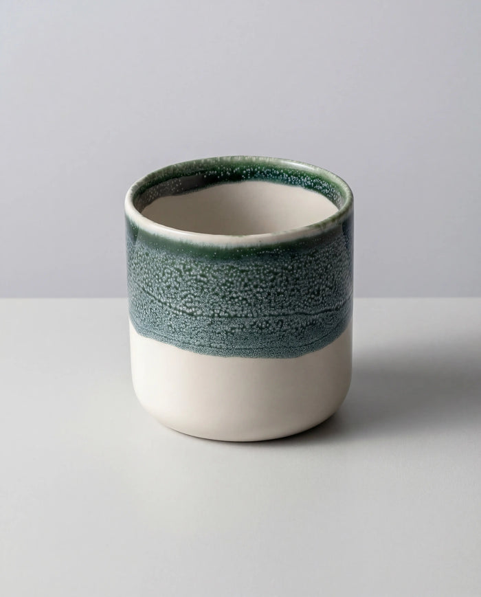 Becher - Tilde