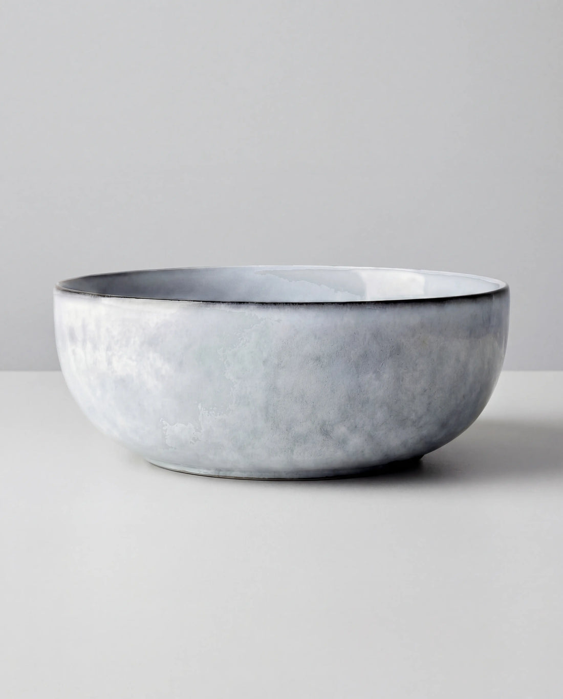 Top view of a Nordic Fjord bowl with grey glaze and curved rim.