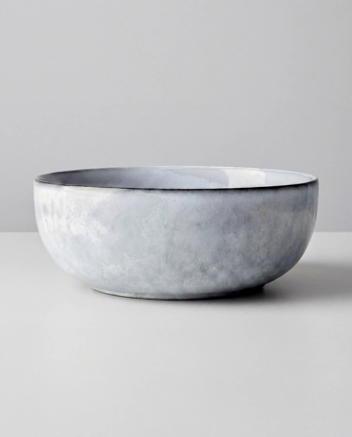 Top view of a Nordic Fjord bowl with grey glaze and curved rim.