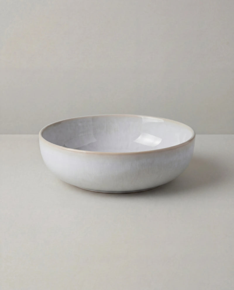 Lyra white ceramic dish set with a bowl resting on a matching plate