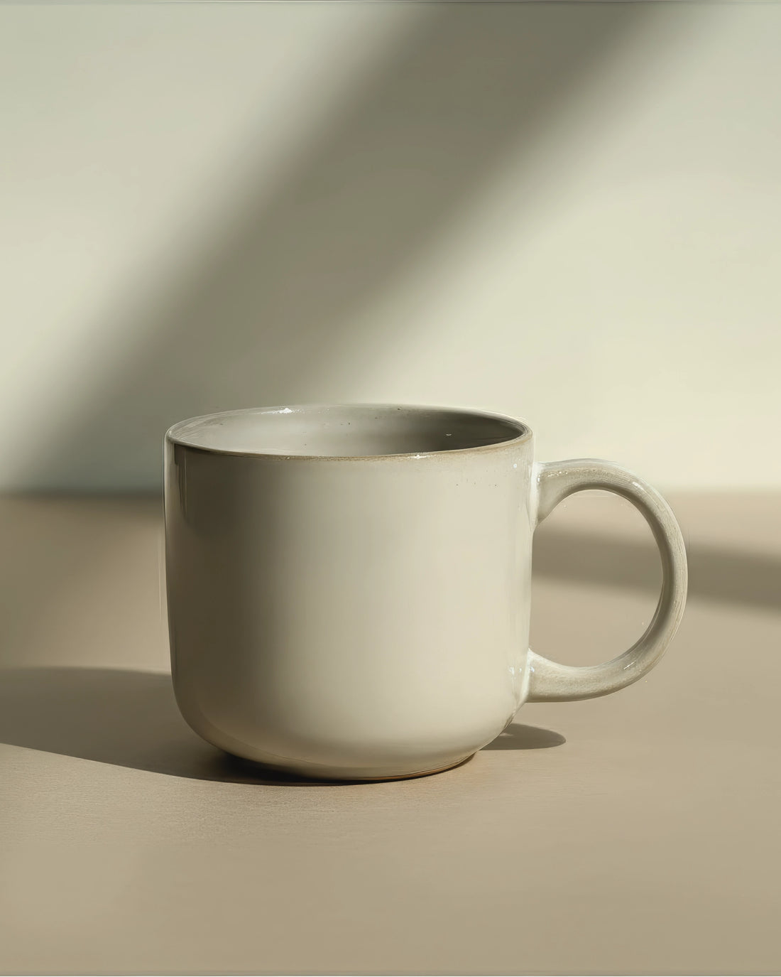 Scandic Sails mug with pale glossy glaze on a light tabletop