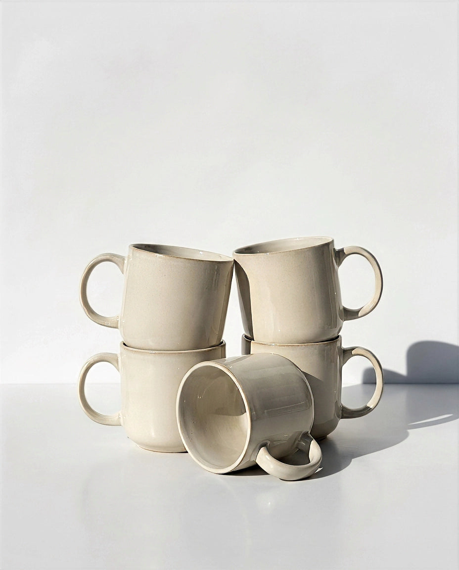 Scandic Sails four piece mug set stacked together on a clean white surface.
